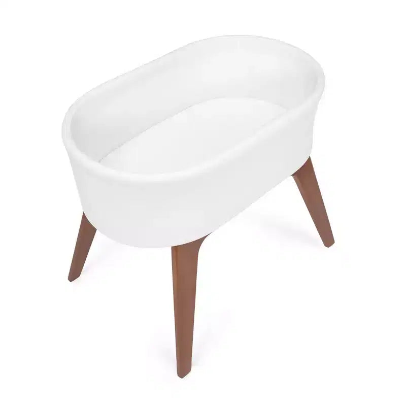 Culla Portatile per Neonati Delta Children Aero con Gambe in Legno, Bianca